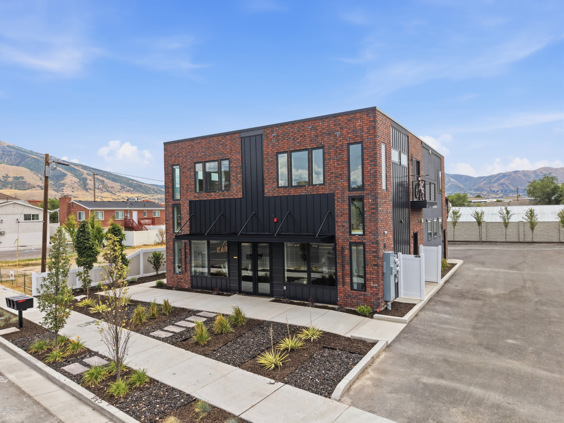 Kairos headquarters building exterior in daylight with mountains behind