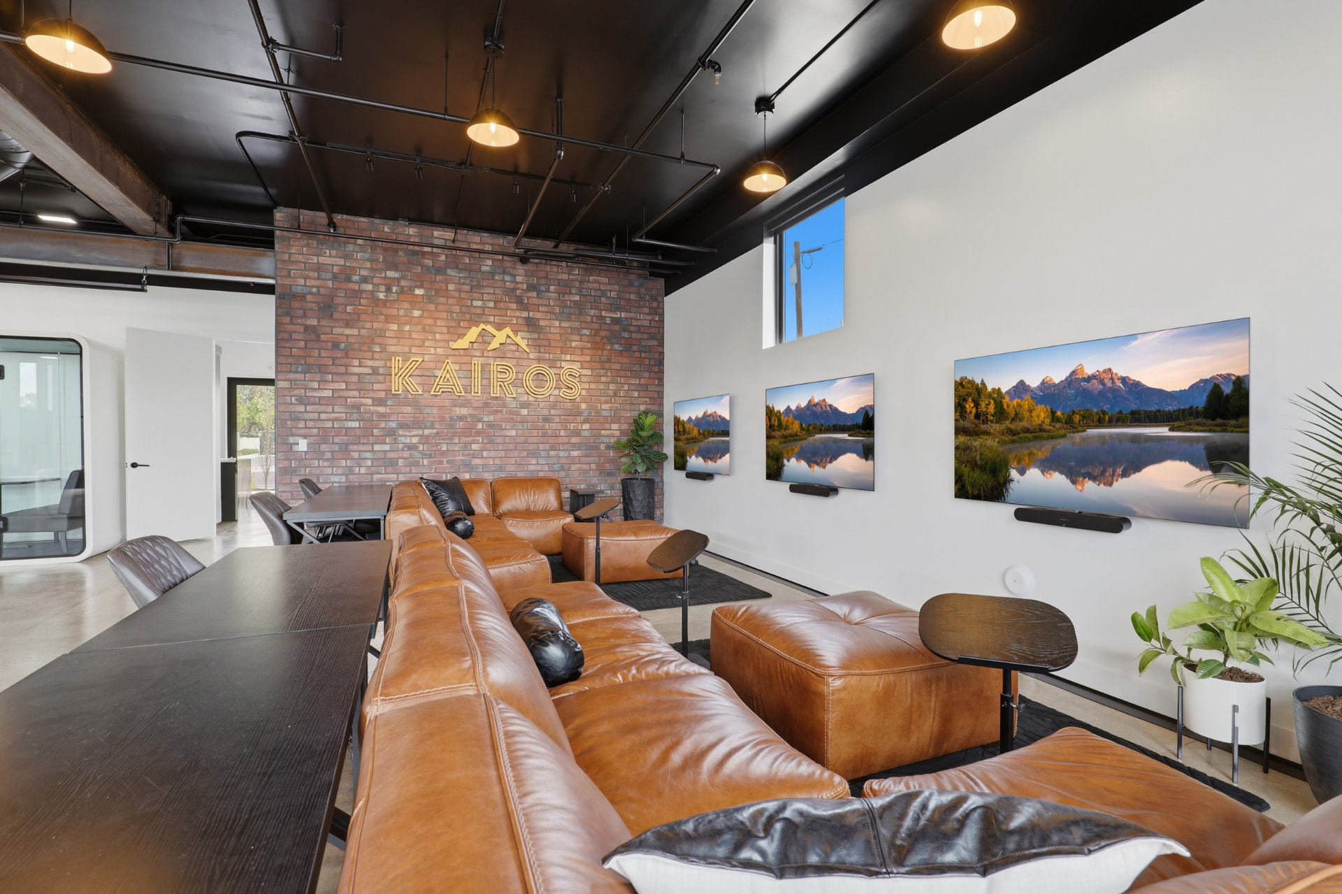 Kairos headquarters lounge seating with mountain artwork